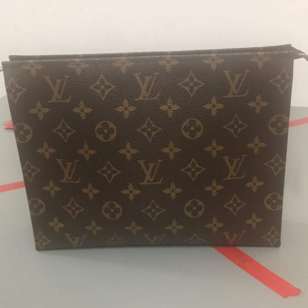 100% authentic Louis Vuitton toiletry pouch